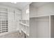 Spacious closet with custom shelving and drawers to maximize storage and organization at 11254 Hwy Nc 50, Benson, NC 27504