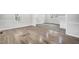 Bright living room showcasing hardwood floors and fresh paint at 11254 Hwy Nc 50, Benson, NC 27504
