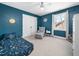 This bedroom boasts a space theme, complemented by a window and neutral carpet at 115 Lockamy Ln, Youngsville, NC 27596