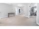 Spacious bonus room featuring neutral carpet and multiple doorways at 115 Lockamy Ln, Youngsville, NC 27596