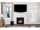Elegant fireplace with a white mantel, perfect for creating a warm and inviting atmosphere at 115 Lockamy Ln, Youngsville, NC 27596