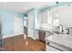 Well-designed kitchen with granite countertops, stainless steel appliances, and hardwood flooring at 115 Lockamy Ln, Youngsville, NC 27596