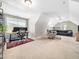 Cozy bonus room with an office area, seating, and plenty of natural light at 115 Lockamy Ln, Youngsville, NC 27596