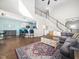 Open living area featuring hardwood floors, neutral colors, and natural light at 115 Lockamy Ln, Youngsville, NC 27596