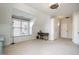 Spacious room with a window seat, desk, and closet providing ample space for work and storage at 12345 Beestone Ln, Raleigh, NC 27614