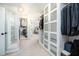 Spacious walk-in closet with built-in organizers, providing ample storage and easy access at 12345 Beestone Ln, Raleigh, NC 27614