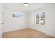 Empty bedroom with hardwood floors and natural light at 1410 Joe Louis Ave, Raleigh, NC 27610