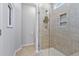 Modern bathroom featuring a glass shower with tiled walls and recessed shelving at 1413 Buxus Ct, Fuquay Varina, NC 27526