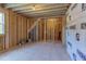 Unfinished attic showing framing and open space to imagine the possibilities at 15 Harvest View Way, Franklinton, NC 27525