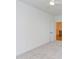 The bedroom features neutral carpet and white trim and walls, with a view to the next level at 15 Harvest View Way, Franklinton, NC 27525