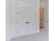 The bedroom features neutral carpet and white trim and walls, as well as a closet at 15 Harvest View Way, Franklinton, NC 27525