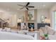 Bright living room with a fireplace, modern furnishings, and natural light at 15 Harvest View Way, Franklinton, NC 27525