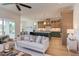 Spacious living area with an open layout, seamlessly connecting to the modern kitchen at 15 Harvest View Way, Franklinton, NC 27525