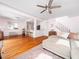 Spacious living room featuring hardwood floors, an open concept kitchen and lots of natural light at 1603 Sutton Dr, Raleigh, NC 27605
