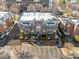 Aerial view of multi-story apartment building featuring balconies and parking at 201 Finsbury St # 302, Durham, NC 27703