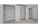 Bedroom with a closet that features two doors for additional space at 201 Finsbury St # 302, Durham, NC 27703