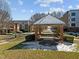 Community gazebo with red brick columns and snow covered roof at 201 Finsbury St # 302, Durham, NC 27703