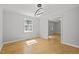 Light-filled dining area with contemporary light fixture and sleek flooring at 208 Hardwood Ridge Ct, Clayton, NC 27520