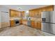 Spacious kitchen features stainless steel appliances and ample cabinet space at 208 Hardwood Ridge Ct, Clayton, NC 27520