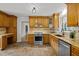 Beautiful kitchen with stainless steel appliances and granite countertops at 208 Hardwood Ridge Ct, Clayton, NC 27520