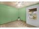 Relaxing bedroom with natural lighting, wood ceiling, neutral carpet, and ceiling fan at 214 Woodcrest Ave, Smithfield, NC 27577
