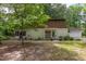Charming home with a screened porch, mature trees, and inviting curb appeal at 214 Woodcrest Ave, Smithfield, NC 27577