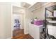 Hallway view with storage and hallway to another room at 214 Woodcrest Ave, Smithfield, NC 27577