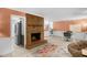 Spacious living room featuring a brick fireplace and an adjacent office space at 214 Woodcrest Ave, Smithfield, NC 27577