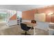 Functional office space featuring neutral carpet, a modern desk, and ample space at 214 Woodcrest Ave, Smithfield, NC 27577