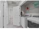 Convenient laundry room with modern washer, dryer, and ample storage space at 2440 Tonoloway Dr, Raleigh, NC 27610