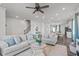 Spacious living room with wood floors, modern decor, and ample seating at 2440 Tonoloway Dr, Raleigh, NC 27610