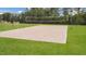 A sand volleyball court is ready for a game in this community, surrounded by a lush green lawn at 2440 Tonoloway Dr, Raleigh, NC 27610