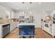 Beautiful kitchen featuring a center island with seating and modern appliances at 2715 Edmund St, Durham, NC 27705