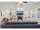 Cozy living room featuring a fireplace, built-in bookshelves, and plenty of natural light at 2715 Edmund St, Durham, NC 27705