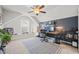 Upstairs office with a neutral color palette, ceiling fan, and natural light at 2715 Edmund St, Durham, NC 27705