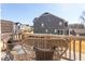 Spacious balcony featuring wicker chairs, a small table, and views of the surrounding neighborhood at 2929 Great Lawn Rd, Apex, NC 27502
