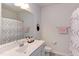 Bathroom featuring a white single sink vanity and neutral finishes at 2929 Great Lawn Rd, Apex, NC 27502