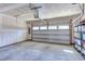 Spacious two-car garage with ample room for parking and storage, featuring a clean concrete floor at 2929 Great Lawn Rd, Apex, NC 27502