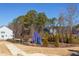Community playground with a colorful play structure, nestled in a well-maintained landscaped area at 2929 Great Lawn Rd, Apex, NC 27502