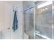 Modern glass enclosed shower with tiled walls and ample space at 2929 Great Lawn Rd, Apex, NC 27502