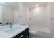 Bathroom features a single vanity with under-sink storage, a toilet, and a tiled shower-bath at 3010 Garner Rd # 102, Raleigh, NC 27610