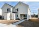 Two-story home featuring white siding, a well maintained lawn and an inviting backyard area at 3010 Garner Rd # 102, Raleigh, NC 27610