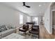 Open-concept living area with a foosball table and view to the dining area at 3010 Garner Rd # 102, Raleigh, NC 27610