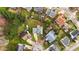 Overhead view of a home's roof, backyard, and surrounding neighborhood at 3208 Marblewood Ct, Raleigh, NC 27604