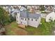 Aerial view of the backyard with a wooden deck at 3208 Marblewood Ct, Raleigh, NC 27604