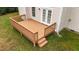 Home features a deck overlooking backyard at 3208 Marblewood Ct, Raleigh, NC 27604