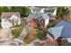 Aerial view of a brick home featuring a two-car garage and beautiful landscaping at 3208 Marblewood Ct, Raleigh, NC 27604