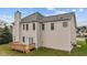 Aerial view of house showcasing a large backyard and wooden deck at 3208 Marblewood Ct, Raleigh, NC 27604