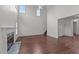 Spacious living room with hardwood floors, fireplace, and bright natural light at 3208 Marblewood Ct, Raleigh, NC 27604