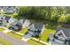 Aerial view of the home showcasing its landscaping, and neighborhood at 340 Olde Liberty Dr, Youngsville, NC 27596